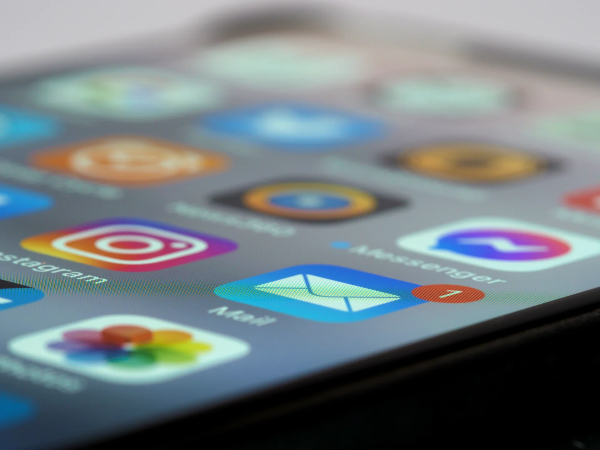 email identity AiTM https://www.pexels.com/photo/icons-on-cellphone-screen-8829445/
