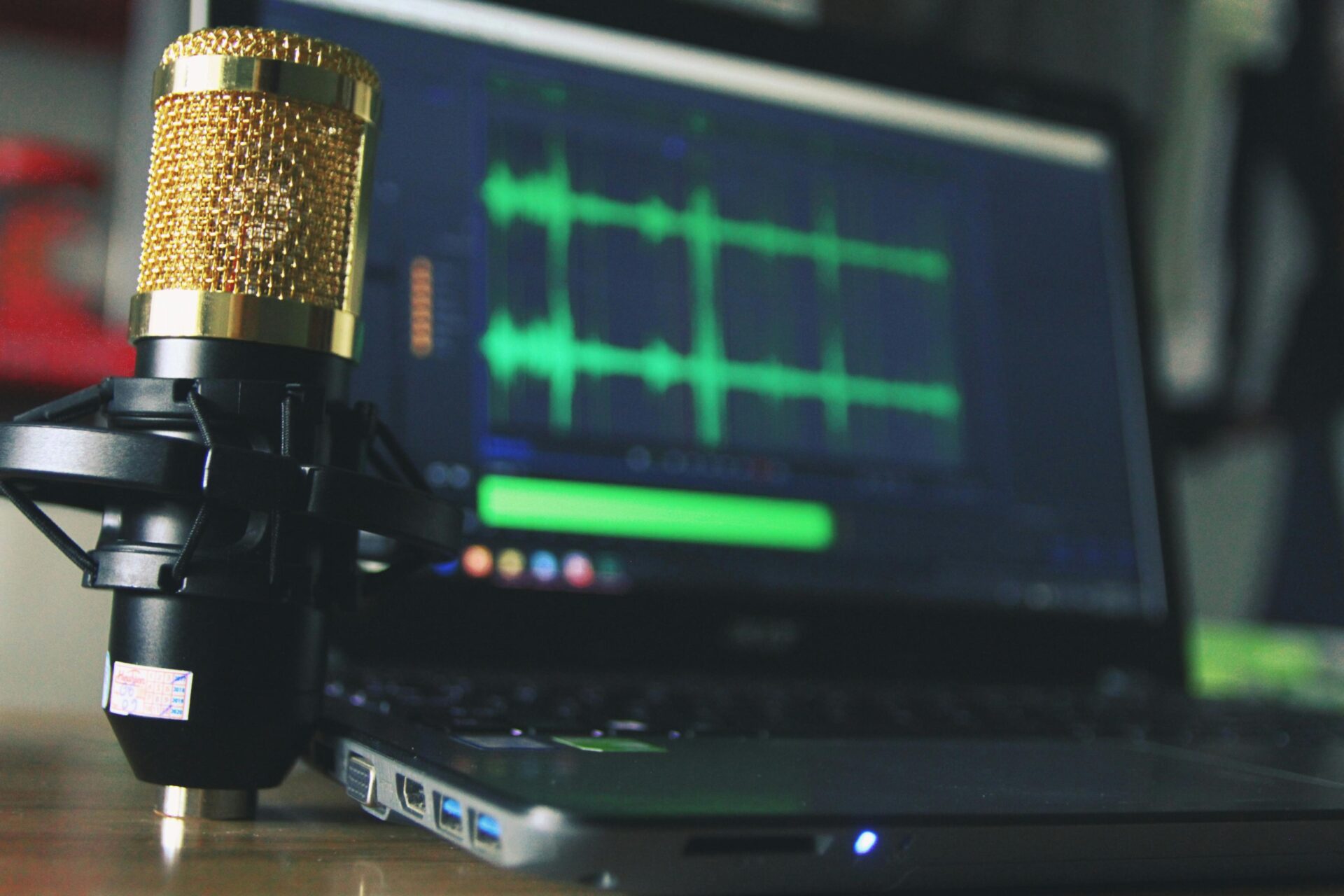 Okta vishing LevelBlue https://www.pexels.com/photo/gold-condenser-microphone-near-laptop-computer-755416/