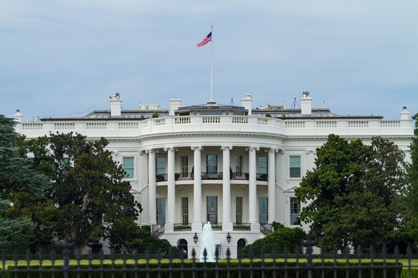 NSPM-12 NSS cyber defense https://www.pexels.com/photo/white-concrete-building-with-flags-on-top-7017138/