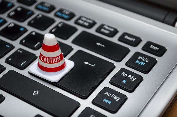 OpenAI Astra https://www.pexels.com/photo/white-caution-cone-on-keyboard-211151/