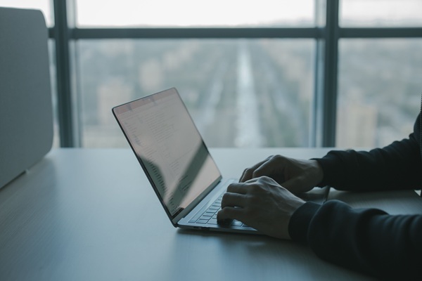 CISA insider threat remote work https://www.pexels.com/photo/person-using-macbook-on-table-5483069/