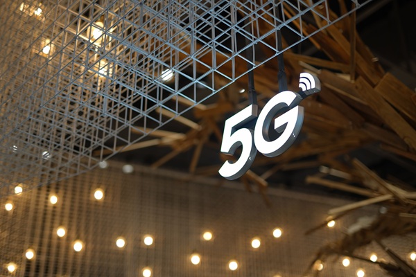 NIST 5G fake cell tower https://www.pexels.com/photo/5g-metal-sign-under-wire-construction-6200343/
